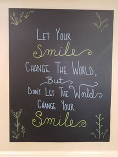 a chalkboard with the words let your smile change the world, but don't let the world change your smile