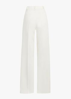 The Low Favorite Pant is our best-selling mid-rise trouser (formerly The Agnes Pant), cast in a structured Italian suiting fabric. With a fluid wide-leg silhouette and front pleats, these classic ivory pants are a true wardrobe essential.74% Polyester 20% Rayon 6% SpandexCare Instructions:Machine wash cold gentle cycleLine dryDry CleanMegan is 5'10" wearing size 2Rise: 11 1/2"Leg Opening: 21"Inseam: 34" Ivory Pants, National Daughters Day, Daughters Day, Suiting Fabric, The Low, Ivory Color, Winter White, Wardrobe Essentials, Black Pants