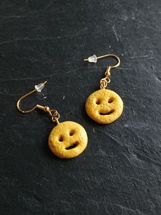 Looking for a fun piece of jewelry to show off your whimsical side? Are you searching for a unique gift? Why not mix it up a little with this one-of-a-kind pair of handmade earrings? These polymer clay smiley fry earrings will leave your mouth watering! They're sure to make you stand out in a crowd or make a fun gift! Each earring is attached to a hypoallergenic silver-colored stud and comes with a butterfly earring back.  Because I make my earrings by hand, each one has a slightly different app Novelty Hypoallergenic Earrings For Party, Hypoallergenic Novelty Earrings For Party, Hypoallergenic Novelty Party Earrings, Novelty Hypoallergenic Party Earrings, Yellow Novelty Earrings With Ear Wire, Novelty Yellow Earrings With Ear Wire, Playful Jewelry With Matching Earrings For Party, Playful Adjustable Dangle Jewelry, Yellow Novelty Jewelry For Party