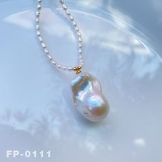 ✿ One picture corresponds to one product  ✿ Item: Natural Freshwater Fireball Baroque Pearl Pendant Necklace ✿ Baroque Pearl Size: 16.6mm（W）    25.4mm（L） ✿ Necklace length：Total 15-16.9 inches or 38-43cm with clasp ✿ Pearl Color: Natural untreated, White Rainbow，with Wonderful iridescent luster ✿ Pearl Shape: Fireball irregular baroque ✿ Accessories material: Filled Gold ✿ Pearls strung on hand-knotted thick silk thread ✿ The handmade necklace come in a fine gift bag, Ideal gifts for Valentines' Day, Mother's Day, Anniversary Day and Birthday to your girlfriend, daughter, wife, and mom to express your sincere love. ✿ We strive to provide you with high-quality jewelry, carefully examining the details of every pearl and every metal accessory. We provide customized services. If you have any n Gift Jewelry With Polished Baroque Pearl Beads, Gift Polished Baroque Pearl Necklaces, Gift Necklaces With Polished Baroque Pearl Beads, Gift Necklaces With Polished Beads And Baroque Pearl, Gift Baroque Pearl Necklace With Polished Beads, Baroque Accessories, Baroque Pearl Pendant, Length Necklace, White Rainbow