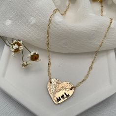 Love is always in style with our Hammered Personalized Heart Necklace. This customer favorite is ideal for initials, a date, a nickname, or a short word. The charming, vintage-style link chain is the perfect finishing touch and adds a romantic vibe. Available in sterling silver or gold finish. Chains and findings are 14kt gold fill or sterling silver. Charm is approx. 3/4 inch. Can be personalized with 6 characters max. Popular symbols for personalization are ♥ &, +(use * to symbolize the heart Personalized Vintage Heart Necklace For Mother's Day, Vintage Heart Necklace For Mother's Day Anniversary, Classic Charm Necklace For Anniversary, Vintage Personalized Heart Necklace For Anniversary, Personalized Vintage Heart Necklace For Anniversary, Heart Charm Nameplate Jewelry For Anniversary Gift, Heart Charm Nameplate Jewelry For Anniversary, Pendant Name Necklace For Anniversary Gift, Classic Double Heart Engraved Jewelry