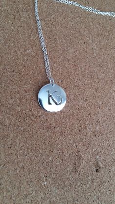 Letter K Necklace, Letter K Jewelry, Monogram Pendant, Personalized Jewelry, Sterling Silver Pendant, Initial necklace, Name Pendant. Handmade letter k pendant in sterling silver.Monogram letter k charm  pendant,hand sewn by myself. Materials is genuine sterling silver,size is 16 mm in 1.5 mm thickness. This pendant is solid silver. Chain length for this pendant is 18 inches,but if you fancy something shorter or longer please do messages me. The pendant will come in a gift box. Mother's Day Silver Initial Pendant Necklace, Mother's Day Sterling Silver Monogram Charm Necklaces, Mother's Day Sterling Silver Monogram Charm Necklace, Sterling Silver Initials Charm Necklace For Birthdays, Sterling Silver Initials Charm Necklace For Birthday, Sterling Silver Monogram Charm Necklace For Mother's Day, Classic Monogram Sterling Silver Charm Necklace, Classic Sterling Silver Monogram Charm Necklace, Sterling Silver Hallmarked Initial Necklace For Anniversary