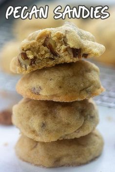 three cookies stacked on top of each other with the words pecan sandies above them