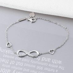 Beautiful sterling silver infinity bracelet that pairs well with any outfit or occasion! Perfect gift idea for her. Bracelets Type: Chain & Link BraceletsMetals Type: SilverMetal Stamp: 925 SterlingMain Stone: ZirconiaItem Type: BraceletsLength:: 18.5cm Silver Infinity Bracelets, Wedding Bracelets, Silver Necklace Set, Silver Bracelets For Women, Infinity Pendant, Infinity Necklace, Silver Chain Bracelet, Love Bracelets, Trendy Jewelry