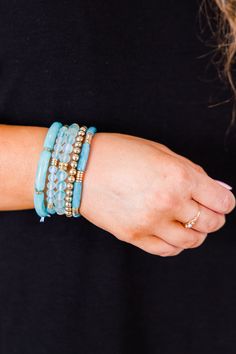 Elevate your style with this fabulous bracelet! This beautiful, beaded design in a lovely blue color can be worn as a set or individually, making it versatile and perfect for any outfit! Show your love and elevate your fashion sense at the same time!