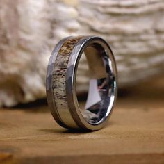 a wedding ring with an antler inlay