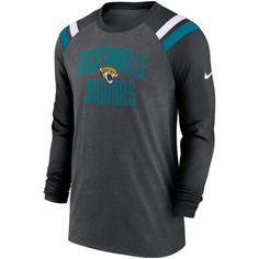 the jacksonville dolphins nike long sleeve tee shirt is shown in grey and teal with white stripes