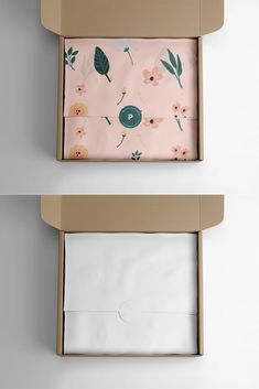 two open boxes with white envelopes and pink floral designs on them, one opened and the other closed