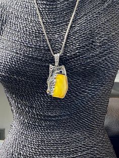 "Artisan Baltic Amber Pendant Hand-made Sterling Silver. Stones used: Amber, Garnet, Citrine, Tourmaline. Height - 65mm, Width - 33mm. Unique Handcrafted One-of a-kind Design Pendant Each Piece of Jewelry in my Collection is Absolutely One of a Kind! When you start wearing a piece of my jewelry you will fall in love with it more and more each day and feel that good Energy and Love that I pass into it while creating this piece of Art. A piece of Art created for you to be inspired and love it thro Handmade Rectangular Pendant Necklace For Formal Occasions, Handmade Formal Necklace With Rectangular Pendant, Formal Handmade Necklace With Rectangular Pendant, Elegant Collectible Necklaces With Rectangular Pendant, Unique Cabochon Necklaces For Wedding, Handmade Square Pendant Necklace For Formal Occasions, Handmade Amber Necklace For Anniversary, Artisan Jewelry With Detachable Pendant For Gift, Elegant Handmade Jewelry With Square Pendant