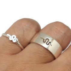 Snake Wedding and Engagement Ring.You will get a set of 2 rings or 1 ring of your choice. Please write your size/sizes at the personalize section.Base Material: 925 Sterling Silver Men Ring Depth: 9mm (Approximately)Women Ring Depth: 5mm (Approximately)Metal Stamped: 925Thickness: 1.5mmRing Size: We can make from US 4 - 14. We accept half-size. Please state after order.**************************************SPECIAL ANNOUNCEMENT 1. Please visit https://www.etsy.com/shop/yhtanaff for more designs.2 Snake Gift, Matching Couple Rings, Promise Ring Set, Promise Rings For Couples, Couples Ring Set, Friendship Rings, Snake Jewelry, Couple Rings, Alternative Engagement Rings