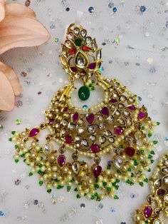 These gorgeous pair of earrings are made with 14k gold and is accented with high quality polki stones and pearls for the perfect statement look! The work is extremely beautiful with handcrafted stones and the colors are perfect to go with any outfit! Indian Bridal, Bridal Earrings, Stone, High Quality, Gold, Color