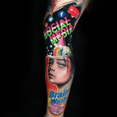 a person with a tattoo on their leg that has the words social media and brainwash