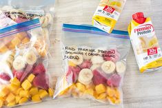 two bags of fruit are sitting on the table