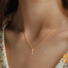 Discover the elegance of simplicity with our Tiny Cross Necklace.  This exquisite piece features a dainty, minimalist gold-plated cross pendant, perfect for adding a touch of grace to any outfit.  Whether you're seeking a thoughtful gift for your girlfriend, a meaningful religious symbol, or a charming accessory for bridesmaids, this gold cross necklace is an ideal choice.  Its delicate design makes it a versatile addition to any jewelry collection, suitable for both everyday wear and special oc Cheap Dainty Cross Pendant Jewelry, Simple Cross Jewelry With Delicate Chain, Simple Cross Necklace With Delicate Chain, Cheap Gold Minimalist Cross Necklace, Minimalist Cross Necklace For Wedding, Simple Gold Cross Necklace For Everyday, Gold Delicate Chain Cross Necklace, Delicate Gold Cross Necklace, Simple Gold Cross Pendant Necklace