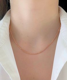 "Shiny And Bright Dainty 14K Rose Gold Beaded Ball Solid Chain. Perfectly Worn Alone Or Layered. Necklace Is Perfect For Any Occasion. A Beautiful Gift She Will Treasure Forever! Jewelry Comes In A Cute Jewelry Box Ready To Present. Model Is Wearing 16\" Chain -All Jewelry Is New And Inspected For Quality Assurance. -Jewelry Is Crafted In Genuine High Quality 14K Gold. -We Do Not Sell Gold Plated Or Gold Filled. Product Detail: Metal: 14k rose gold Weight: 16\" inch 5.2 grams Width: 2mm Closure: Elegant Rose Gold Beaded Chain Necklace, Dainty Rose Gold Beaded Necklaces, Rose Gold Necklaces With Round Tiny Beads, Rose Gold Single Strand Necklace With Round Beads, Classic Rose Gold Necklaces With Round Beads, Delicate Rose Gold Jewelry With Beaded Chain, Dainty Rose Gold Beaded Necklace Gift, Dainty Rose Gold Beaded Necklace, Elegant Rose Gold Necklaces With Tiny Beads