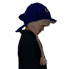 - Knitted hat- This beanie hat is one size.- It is a stretchy beanie for children and adults.- It fits from a 4-year-old child up to an adult. - Has earflaps with braids.- Has tassels on the braids ends. - It is made of 100% wool outside and it has a fleece lining inside.- It is perfect for going out in the cold weather.Measurements:Head circumference: 20" to 24"Hat Length: 7" to 8"Earflaps Length: 6"Care Instructions:- Gently Hand wash- Do not wring- Lay flat to dry- Do not tumble dry Adjustable Warm Hats For Outdoor, Warm Adjustable Outdoor Hats, Adjustable Beanie With Ear Flaps For Outdoor, Adjustable Cap For Cold Weather, Adjustable Brimmed Beanie For Cold Weather, Fun Brimmed Winter Hat, Fun Winter Brimmed Hats, Whimsical Adjustable Winter Hat, Whimsical Winter Hats Adjustable Fit