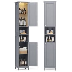 two tall gray cabinets with shelves and bottles