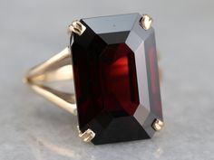 Fine Jewelry Burgundy Garnet Ring, Burgundy Garnet Rings Fine Jewelry, Classic Evening Ruby Jewelry, Formal Garnet Burgundy Ring, Formal Burgundy Garnet Ring, Formal Garnet Rings With Accent Stones, Elegant Garnet Gemstone Ring, Formal Garnet Ring With Polished Finish, Luxury Solitaire Ruby Ring For Formal Occasions