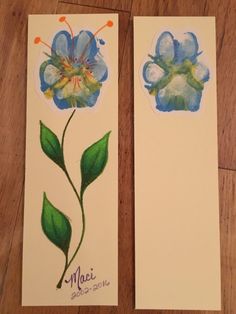 two cards with watercolor flowers on them