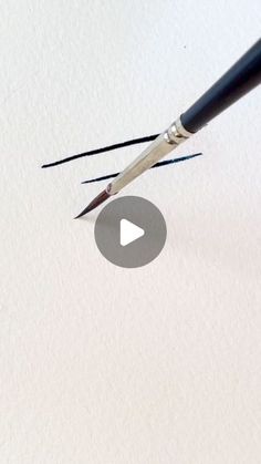 an image of a pen that is writing something on the paper with it's tip sticking out