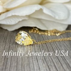 "This pendant is a pear shape yellow simulated diamond made with pure 14k yellow gold and 18\" yellow gold cable chain included item #5697 Approximate total carat weight: 2.00ctw diamond equivalent -Center Stone Size: 10x7mm -Gem Type: Simulated Diamond -Center Stone Shape: Pear Shape -Center Stone Color: Yellow -Center Stone Clarity: VVS1 -Metal Type and Purity: 14k Yellow Gold -Chain: 18\" delicate 14k gold chain / heavier option with lobster claw available (use dropdown to select) -Country of Gold Teardrop Pendant Solitaire Necklace With Brilliant Cut, Gold Solitaire Necklace With Brilliant Cut Teardrop Pendant, Gold Brilliant Cut Teardrop Pendant Necklace, Pear Shaped Diamond Cut Solitaire Necklace For Anniversary, Pear Shaped Solitaire Necklace For Gift, Yellow Gold Drop Necklace For Anniversary, Pear Shaped Solitaire Necklace For Anniversary, Pear Shaped Yellow Gold Cubic Zirconia Jewelry, Gold Solitaire Teardrop Necklace With Diamond Cut