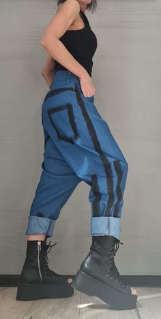 "Casual Denim Harem Pants/Extravagant Pants/Boho Pants/Baggy Pants/Unisex Denim/Women Denim Harem ❤️ Extravagant designs and high quality fabrics! ❤️ Materials & Care Denim, Cotton, Textile Hand wash at low temperatures. Do not machine dry. Do not iron. Do not dry clean! ❤️ Sizing We can make your piece from XS to 5XL! Everything in the shop can be also made according to your measures free of charge! ❤️ Shipping ✈ Ready to ship The time I need to prepare an order for shipping varies. For details Bohemian Straight Leg Non-stretch Jeans, Non-stretch Denim Blue Bohemian Jeans, Non-stretch Bohemian Jeans With Pockets, Non-stretch Bohemian Denim Blue Jeans, Non-stretch Bohemian Denim Jeans, Non-stretch Bohemian Jeans In Denim Blue, Bohemian Baggy Jeans For Spring, High-waist Bohemian Denim Jeans, Bohemian Style Denim Blue Cotton Pants