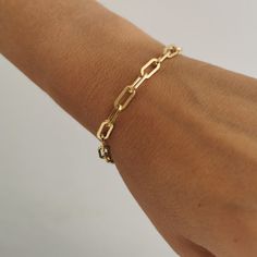 This Italian handcrafted chain link bracelet is completely composed of sterling silver and 18k gold plated silver and is uniquely made with a semi-hollow interior for comfortable everyday wear that will not dent An extender chain 16cm+2cm means it adjusts to fit different sizes. . Each individual necklace is unique and one of a kind and cleaned, buffed and polished. - we use only the finest quality materials - all components are 100% sterling silver or 18k Gold plated (Nickel free) - all pieces are designed in our happy studio Thick Oval Link 18K silver plated Gold Italian Chain Link Bracelet  D E T A I L S * Available in sterling silver or Crafted in Gold plated .925 sterling silver * Very easy to put on * An extender chain means it adjusts to fit different sizes 16-18cm.  All jewelry com Gold Link Bracelet As Gift, Gold Link Paperclip Bracelet, Tarnish Resistant, Gold Link Bracelet Gift, Gold Plated Oval Link Paperclip Bracelet Gift, Tarnish Resistant Gold Link Paperclip Bracelet, Dainty Gold Paperclip Bracelet With Solid Links, Everyday Rolo Chain Bracelet, Tarnish Resistant Gold Paperclip Link Bracelet, Gold Tarnish-resistant Link Paperclip Bracelet