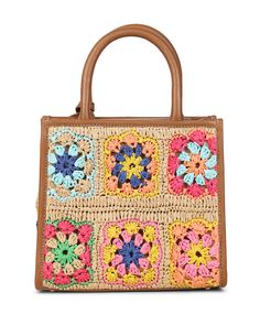 a brown purse with colorful crocheted flowers on it