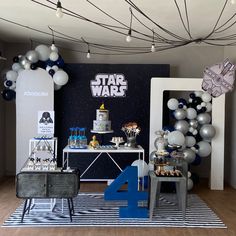 a star wars themed birthday party with balloons and decorations