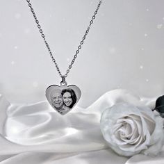 Whether it's an anniversary, birthday, wedding, or a simple gesture of love and friendship, our custom heart necklace embodies the promise of cherished moments and life's precious memories. The necklace can be engraved with any photos, words or any design of your choice on one or both sides. ❤ WE SHIP WITHIN 48 HOURS! ❤ TO ORDER follow these 4 simple steps: 1) Pick your options in the drop-down bars. 2) Leave your preferred CHAIN LENGTH in the personalization box. 3) Add to cart - Go to checkout Silver Heart Necklace For Valentine's Day Wedding, Customizable White Gold Necklace For Anniversary, Silver Heart Necklace For Wedding On Valentine's Day, Customized Necklace For Anniversary, Valentine's Day Gift, Customizable Pendant Necklaces For Anniversary, Customized Necklace For Valentine's Day Anniversary Gift, Customized Necklaces For Anniversary Gift On Valentine's Day, Heart Pendant Necklace Wedding Gift, Customizable Pendant Necklace For Anniversary