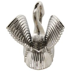 a silver swan figurine sitting on top of a white background