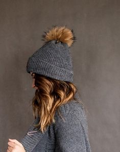 All our knitted hats are with 100% cotton lining so it's perfect for chilly spring weather. Wind resistant and the head is not sweating. Because of the lining hats don't stretch and keep its shape. Fur pom color can be a bit different because fur is natural and not colored. Material: 70% Merino wool, 30% alpaca woolLining: 100% cottonPom pom: Natural furColors available: Ivory, Black, White, Dark grey, Light grey, Dark blue, RedSizes available: S 22 inches , 56/58 cm , M  23 inches, 58/60 cmCare Fleece-lined Beanie, Winter Beanie With Pom Poms, Winter Cotton Bonnet Cap, Cotton Winter Bonnet, Fleece-lined Beanie Cap, Casual Winter Beanie With Pom Poms, Fleece-lined Beanie Cap, One Size Fits Most, Winter Outdoor Beanie Bonnet, Fleece-lined Beanie, One Size Fits Most