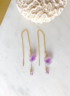 This Natural Raw Amethyst rough stones (10-12mm) threaders earrings in gold or sterling silver threaders. The pair also comes with a dangling tiny 4mm amethyst bead accent. Very pretty, unique and delicate statement earrings. 💜Simple, Dainty and Elegant Raw Natural Stone for everyday wear. I usually wear it with a matching necklace. Simple yet elegant especially the shine and color are so gorgeous.The picture does not do it justice it and is much prettier in person. Perfect for birthday, Christ Dainty Drop Earrings With Natural Stones, Handmade Purple Jewelry In 14k Gold Filled, Nickel-free 14k Gold Filled Threader Earrings As Gift, Gold Amethyst Dainty Earrings, Dainty Gold Amethyst Earrings, Delicate Adjustable Threader Earrings As A Gift, Delicate Drop Earrings With Natural Stones, Delicate Natural Stone Drop Earrings, Adjustable Yellow Gold Threader Earrings For Gifts