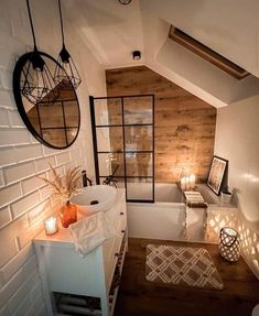 the bathroom is decorated in white and wood