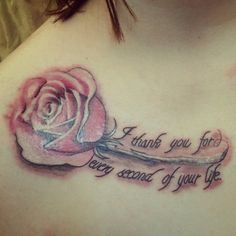 a woman with a rose tattoo on her chest saying thank you for every second of your life