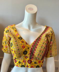 A yellow color embroidered blouse  Product details Fabric -Georgette Embroidery - Silk threads and sequins Bust size 38" Waist 30" Sleeve length  10" Can be tailored to fit 40" For extra charges Womens Blouses, Silk Thread, Embroidered Blouse, Yellow Color, Womens Clothing Tops, Blouses For Women, Blouses, Tops & Tees, Sleeve Length