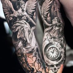 a man with tattoos on his arms and arm is holding a clock in front of an angel