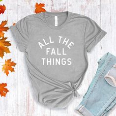 All The Fall Things in a modern font graphic on front in cream or multi Fall colors. Youth Sizes S-XL (unisex sizing) Toddler Sizes 2T, 3T, 4T To view All The Fall Things Adult T-shirts click here.To view All The Fall Things Baby Bodysuit click here.Bella + Canvas4.2 oz. Airlume combed and ring-spun cottonPre-shrunkFor a more relaxed fit, size up! Everyday Fall T-shirt With Letter Print, Everyday Fall Slogan T-shirt, Fall Everyday T-shirt With Screen Print, Fall Graphic Tee Soft-washed, Gray Text Print T-shirt For Fall, Fall Gray Graphic Print T-shirt, Gray Graphic Print T-shirt For Fall, Casual Fall T-shirt With Text Print, Gray Relaxed Fit T-shirt For Fall