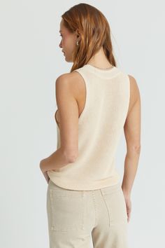 Our ribbed knit sleeveless top is the essential warm weather top. It's airy and shows just enough shoulder for a cool summer look. Summer Ribbed Tank Vest, Ribbed Tank Vest For Summer, Summer Textured Knit Tank Top For Layering, Chic Beige Ribbed Tank Top, Chic Stretch Vest For Spring, Chic Spring Sweater Vest For Everyday, Stretch Pointelle Knit Tank Top For Layering, Ribbed Vest For Everyday Spring Wear, Summer Cotton Ribbed Sweater Vest