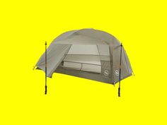 a tent with two poles attached to it