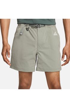 Lightweight, stretchy and ready for adventure, these water-repellent nylon shorts wick away sweat and give you secure pockets for stowing a day's essentials. 6 1/4" inseam; 27" leg opening; 13" front rise; 15" back rise (size Medium) Zip fly with button closure Partial elastic waist Removable belt Front zip pockets; back zip-welt pocket Moisture-wicking fabric engineered for dryness and comfort Water-repellent 96% nylon, 4% spandex Machine wash, tumble dry Imported Nordstrom x Nike: A curated li Functional Shorts With Drawstring For Outdoor Activities, Functional Drawstring Shorts For Outdoor Activities, Functional Relaxed Fit Shorts For Hiking, Athletic Shorts With Functional Drawstring For Outdoor Activities, Sporty Outdoor Shorts With Functional Drawstring, Relaxed Fit Functional Shorts For Outdoor, Nike Functional Nylon Athletic Shorts, Nike Bottoms With Built-in Shorts For Outdoor Activities, Outdoor Nylon Moisture-wicking Shorts