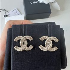 Brand New With A Tag, Care Card And Beautiful Camellia Packaging! Classic Chanel Cc Logo Design With Crystal It Is Stunning More In Person! Daily Style As Casual And Dressy Always Popular Design And Extremely Hard To Get! Sold Out Now Size About 0.8*0.6inch Cc Logo Design, Rounded Wardrobe, Chanel Stud Earrings, Classic Chanel, Jewelry Chanel, Luxury Jewelry Brands, Diamond Jewelry Designs, Dope Jewelry, Chanel Earrings