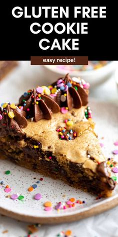 a slice of gluten free cookie cake on a plate with sprinkles