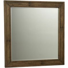 a wooden framed mirror on a white background