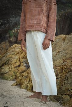 Unisex Fisherman Thai Pants made of strong high quality cotton.  Comfortable and loose-fitting for everyday use and/or yoga practice. You can find the Men Boho Vest here: https://www.etsy.com/listing/553728556/ And the Khadi Hooded Vest here: https://www.etsy.com/uk/listing/553728556/ SIZE: One size - adjustable between S-XL COLOR: Natural Off-White  ☼ NATURAL FABRICS Most of our clothes are made with handwoven fabrics and natural dyes which make each piece beautifully unique in colour, texture and look.  ๑ WASHING CARE We recommend to always handwash/gentle cycle your natural clothes with an organic detergent to keep the fabrics in the best condition and care for mother earth. --------------------------------- ✴︎ More Earthy PANTS https://etsy.me/2OAA1hp ❁ Our shop on ETSY  https://www.et Earthy Pants, Gilet Boho, Natural Clothes, Pantalon Thai, Organic Detergent, Men Boho, Thai Pants, Fisherman Pants, Pants Boho