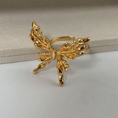 🌻This Gold Butterfly Ring features a delicate butterfly design, adding a touch of elegance and charm to your style. 🥰This piece is meticulously crafted from S925 sterling silver (total 5.6g) and finished with a luxurious coating of genuine 18k gold plating. 🥰This ring is adjustable to fit your desired size. 🥰We will send it in a beautiful jewelry box and package it carefully. We offer boxes in blue, green, white, and black. Please leave a message specifying your preferred color 🥰Please leav Luxury Butterfly Rings For Gifts, Luxury Butterfly-shaped Ring For Gift, Luxury Butterfly Ring For Gift, Luxury Butterfly Rings For Gift, Elegant Butterfly Shaped Rings, Elegant Gold Butterfly Ring For Gift, Elegant Butterfly Ring Gift, Elegant Gold Butterfly Ring For Anniversary, Elegant Butterfly Ring For Anniversary