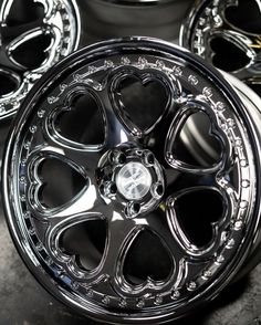 chrome wheels with hearts on them are shown