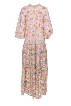 Stay fashionable and free-spirited in this boho-chic maxi dress from the Anjuna Collection! Boasting gorgeous crochet detailing at the frilled neckline, the floral and paisley print gives that feminine look a sweet lift with playful tassels and puff sleeves. You'll be sure to turn heads in this bohemian gem! Size M 100% Cotton Made in Italy Pullover Unlined Crochet v-neck Puff sleeves w/ elastic cuffs Bust 46" Waist 45" Shoulder to hem 56.5" Sleeve length 26" Spring Bohemian Maxi Dress With Elastic Neckline, Bohemian Spring Dresses With Paisley Print, Spring Boho Maxi Dress With Paisley Print, Feminine Boho Print Maxi Dress, Maxi Dress With Elastic Neckline For Daywear, Spring Long Boho Dress With Ruffles, Bohemian Paisley Print Daywear Dresses, Feminine Flowy Maxi Dress With Floral Embroidery, Flowy Feminine Floral Embroidered Maxi Dress