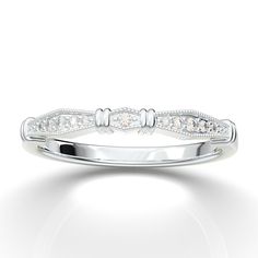 "White Gold Vintage Style Diamond Wedding Band from AurosiJewelsCouture TRY BEFORE YOU BUY! With our exclusive at home try on service. Learn more here: https://www.etsy.com/listing/481629574/ This art deco inspired diamond wedding band from Aurosi Jewels is a one of a kind, timeless masterpiece! The unique bar style setting and intricate shape of the motifs is accented with genuine diamonds that sparkle and dazzle to make it stand out amongst the crowd. There is milgrain etching to give a vintage style design, while the construction and shape of the ring make it elegant and classic. Available in white, yellow, and rose gold, as well as Platinum, this white gold vintage inspired wedding band will complete your engagement set and make her smile every time she looks down at her finger. Please Wedding Ring Matching, Vintage Inspired Wedding Band, Filigree Wedding Band, Gold Band Wedding Ring, Gold Ring Wedding, Wedding Band For Women, Contour Wedding Band, Ring Matching, Engagement Sets