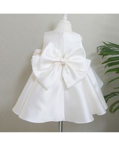 Buy simple satin sleeveless wedding couture flower girl dress with big bow decoration at wholesale price online. Free shipping and pro custom service since 2009. Bridesmaid Princess Dress With Satin Bow, Satin Bridesmaid Princess Dress With Satin Bow, Satin Princess Dress With Satin Bow, Elegant Princess Wedding Dress With Bow Tie Back, Elegant Wedding Princess Dress With Bow Tie Back, Princess Style Baptism Dress With Bow, Satin Princess Bridesmaid Dress, Princess Style Satin Bridesmaid Dress, Princess Satin Bridesmaid Dress